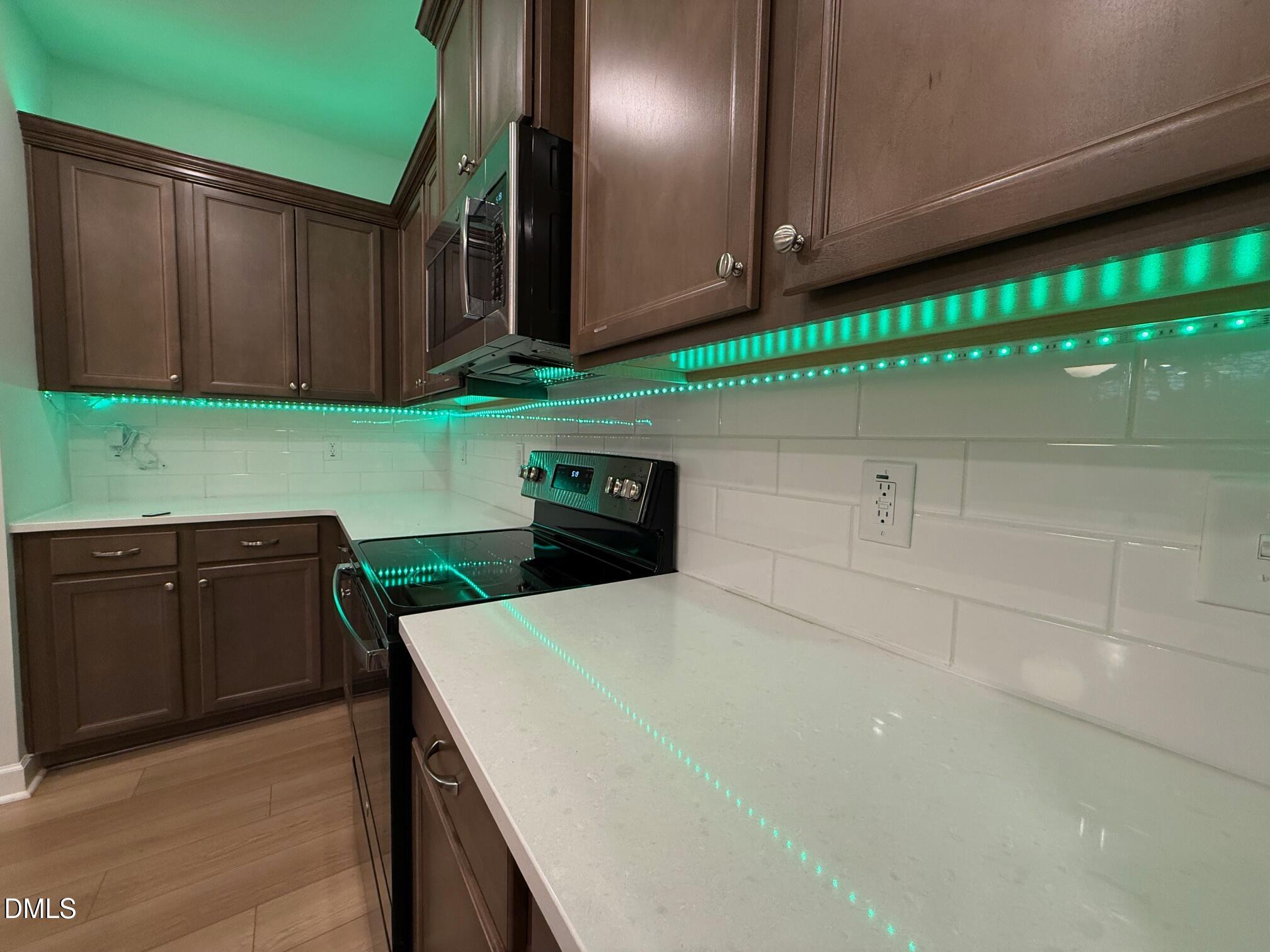 230 George Pine Way Knightdale, NC 27545 - Photo 27 of 31 a kitchen with a sink and cabinets