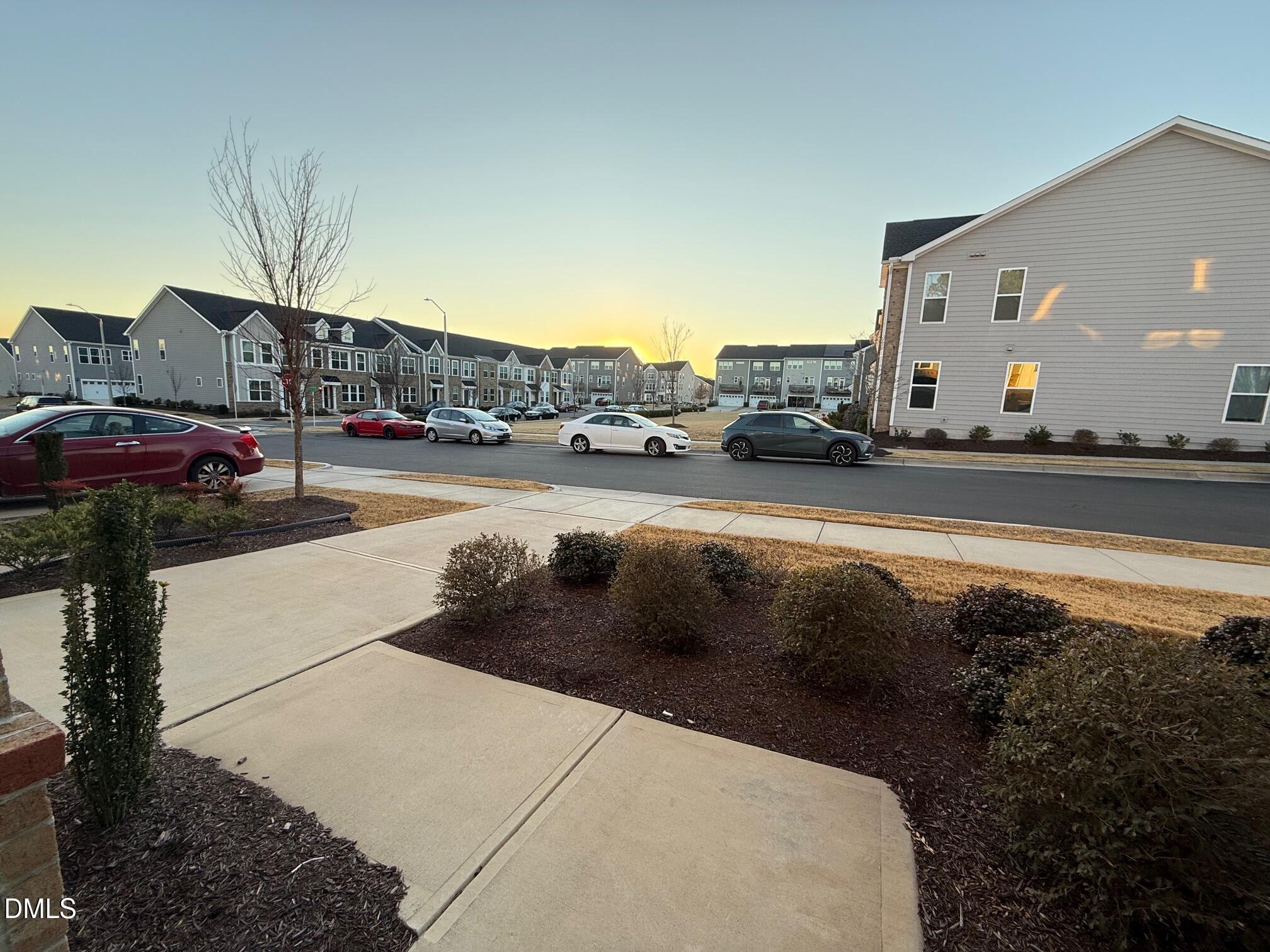 230 George Pine Way Knightdale, NC 27545 - Photo 5 of 31 a view of city street with a car parked on the road
