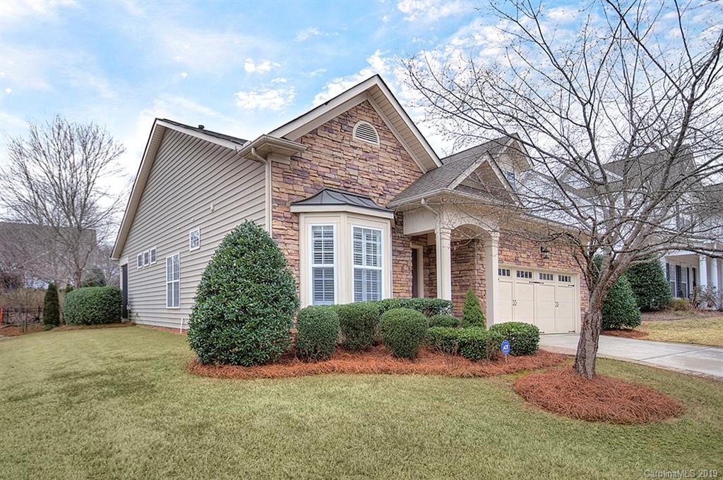 907 Treasure Court Fort Mill, SC 29708 - Photo 3 of 31 a front view of a house with a yard and garage