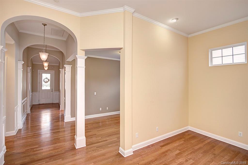 907 Treasure Court Fort Mill, SC 29708 - Photo 7 of 31 a view of a room with wooden floor