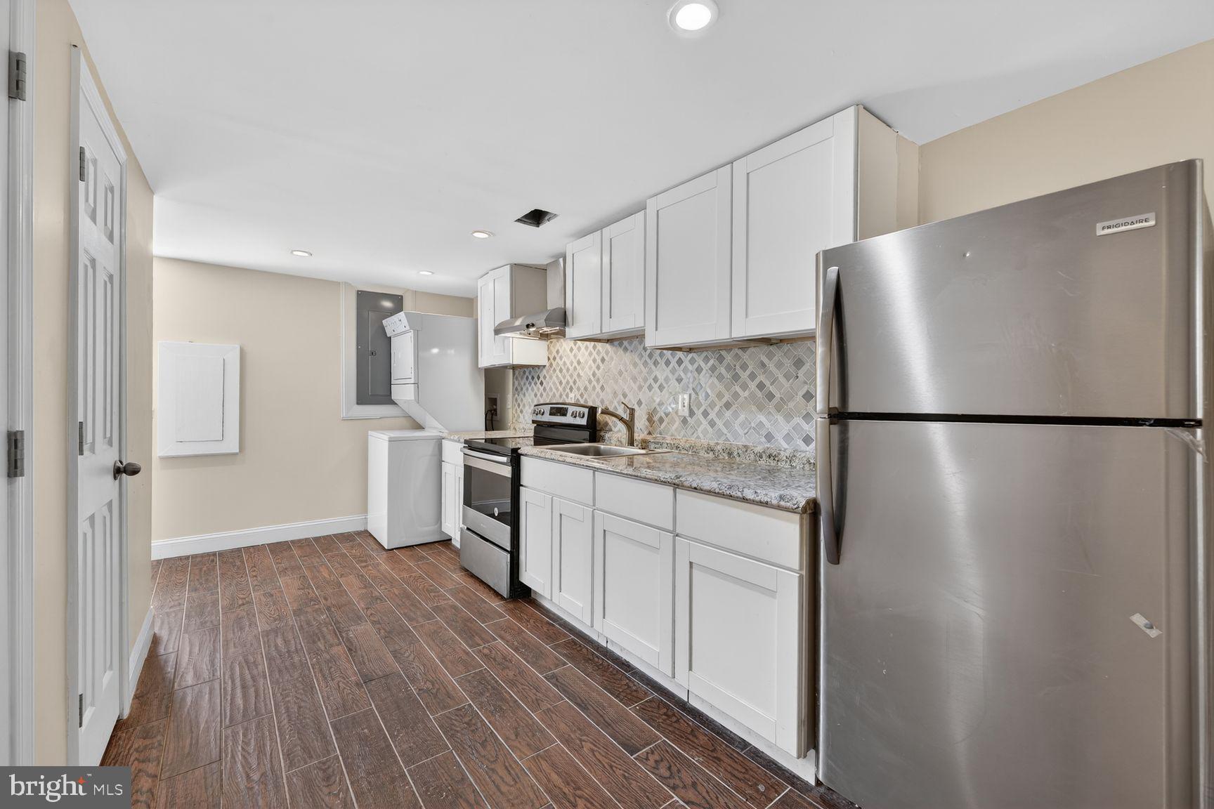 7205 Livingston Road Oxon Hill, MD 20745 - Photo 19 of 25 Modern kitchen with sleek finishes.