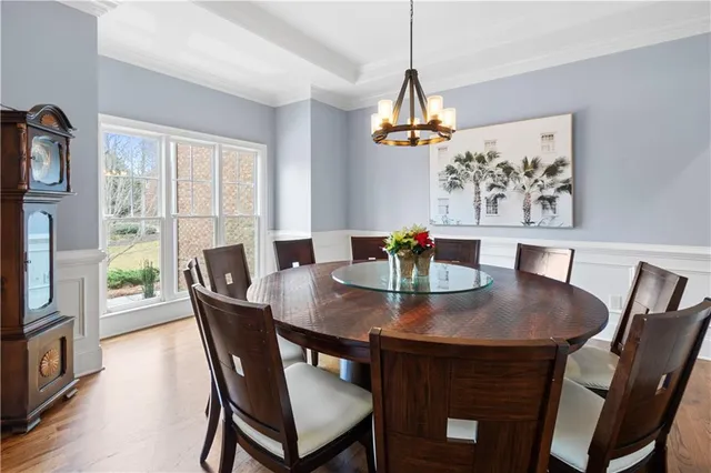 a bed room with furniture and window
