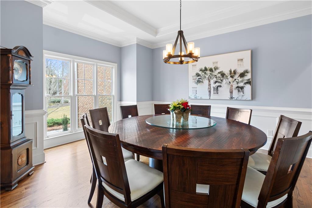 1625 Hamiota Ridge Alpharetta, GA 30004 - Photo 17 of 86 a view of a dining room with furniture window and wooden floor