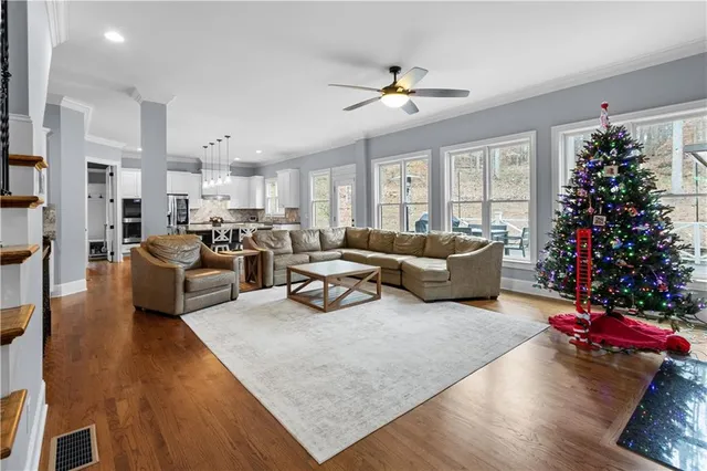 a bedroom with furniture and a chandelier