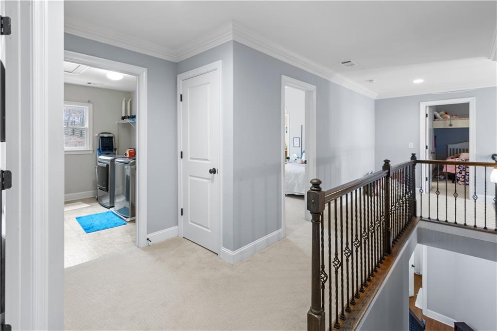 1625 Hamiota Ridge Alpharetta, GA 30004 - Photo 34 of 86 a view of a hallway with workspace and entryway