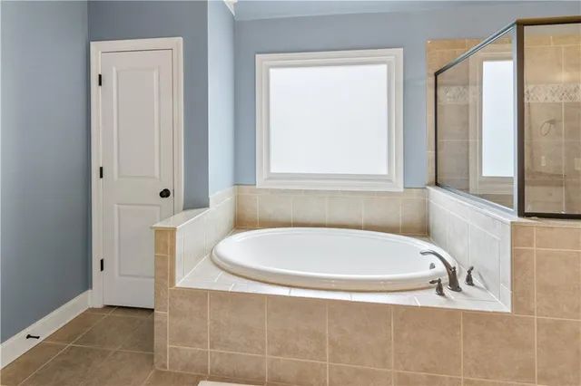 a view of balcony with wooden floor and outdoor seating