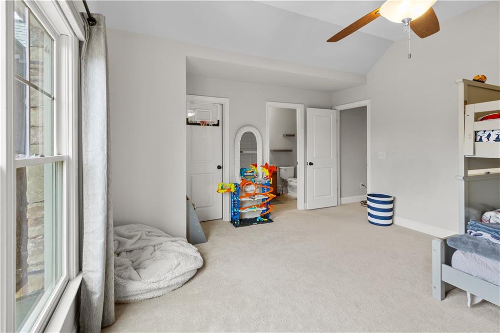 1625 Hamiota Ridge Alpharetta, GA 30004 - Photo 46 of 86 a children room with toys and a chandelier