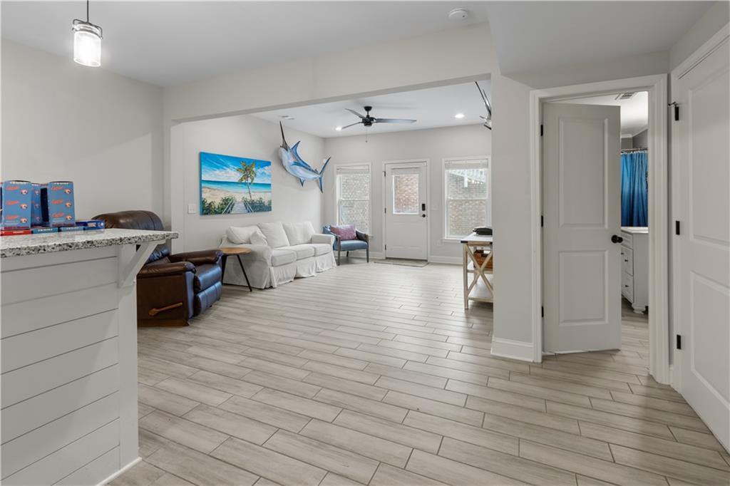 1625 Hamiota Ridge Alpharetta, GA 30004 - Photo 56 of 86 a living room with furniture and a flat screen tv