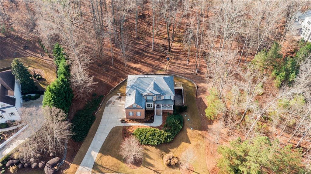 1625 Hamiota Ridge Alpharetta, GA 30004 - Photo 73 of 86 a front view of a house with a yard
