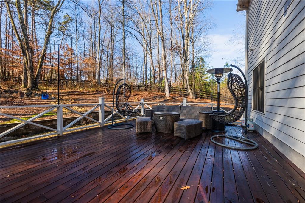 1625 Hamiota Ridge Alpharetta, GA 30004 - Photo 9 of 86 a view of a chairs on the roof deck