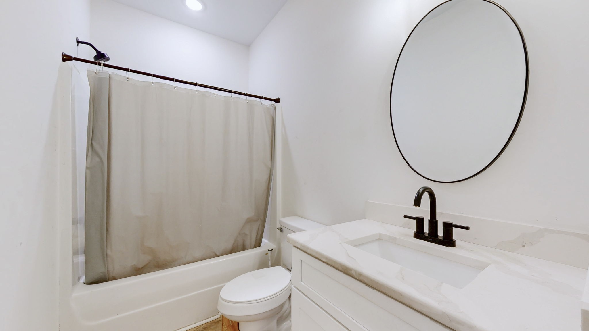 1663 Taylortown Road White Bluff, TN 37187 - Photo 15 of 38 a bathroom with a sink a toilet and a mirror