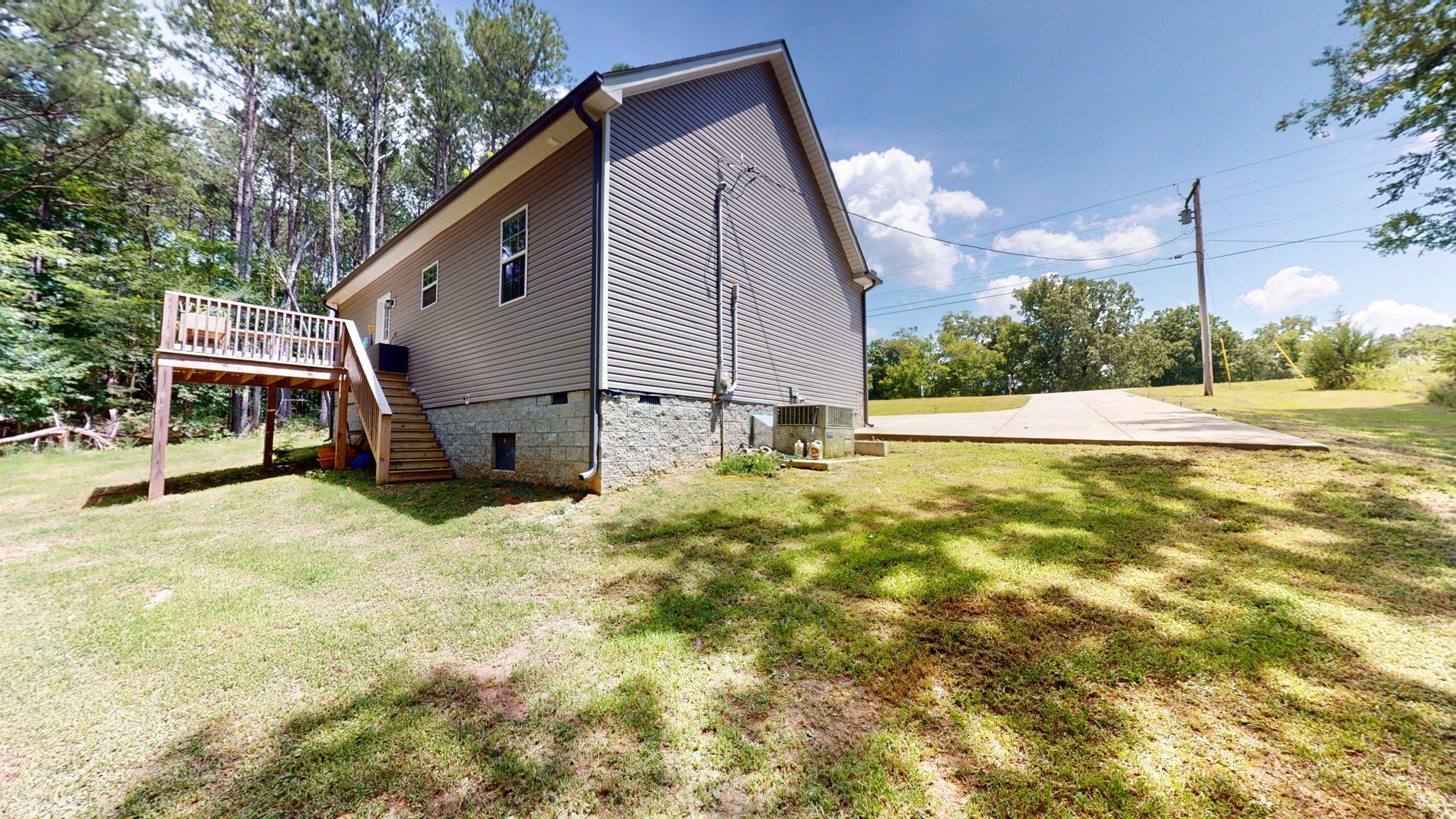 1663 Taylortown Road White Bluff, TN 37187 - Photo 30 of 38 a backyard of a house with table and chairs