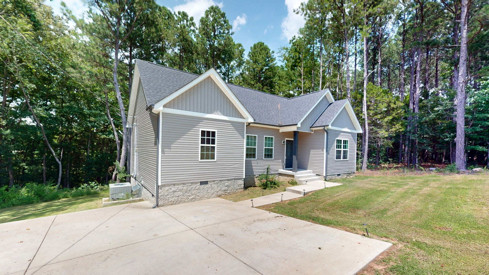 1663 Taylortown Road White Bluff, TN 37187 - Photo 31 of 38 a front view of a house with a yard