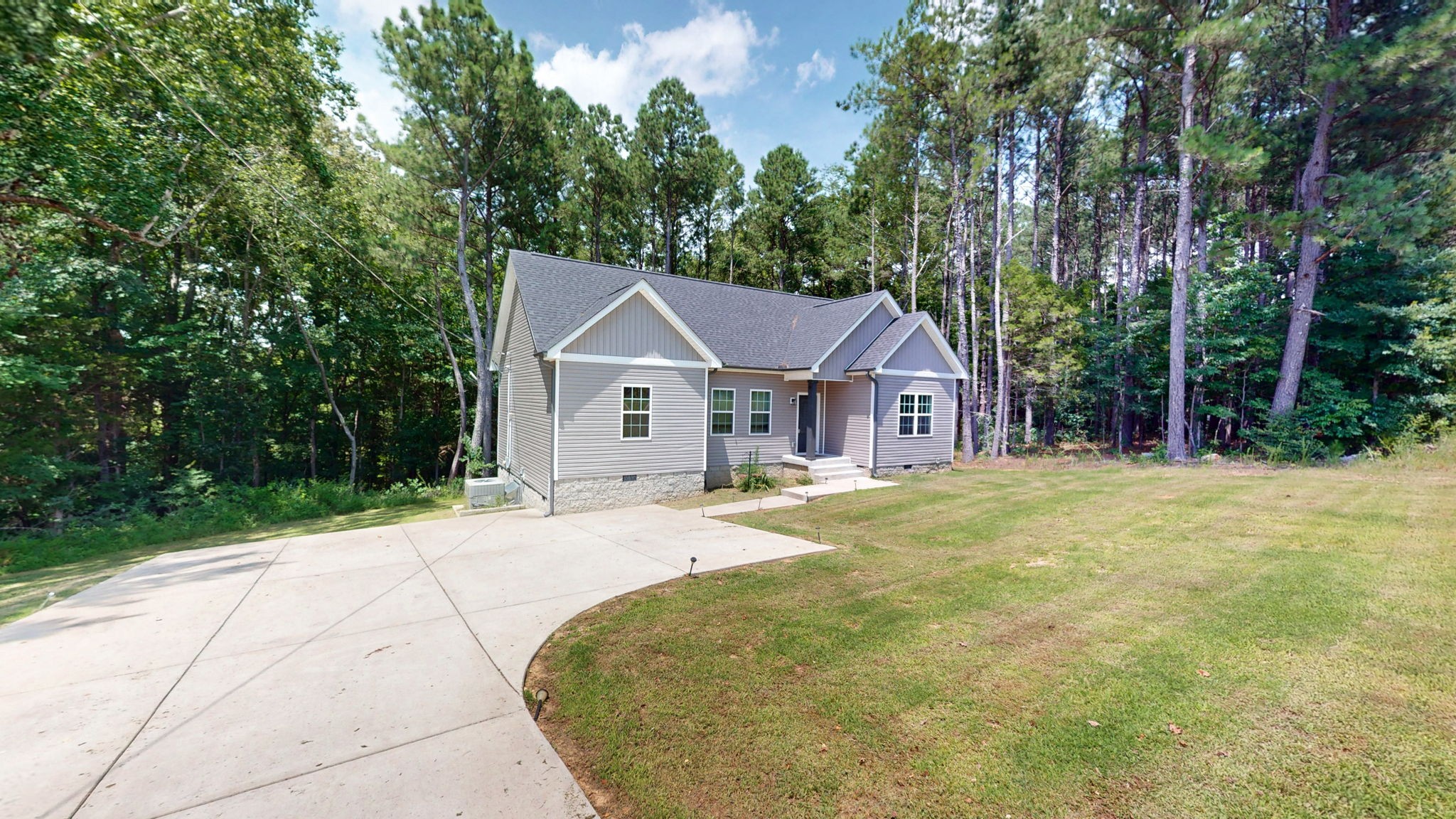 1663 Taylortown Road White Bluff, TN 37187 - Photo 32 of 38 a house with trees in front of it