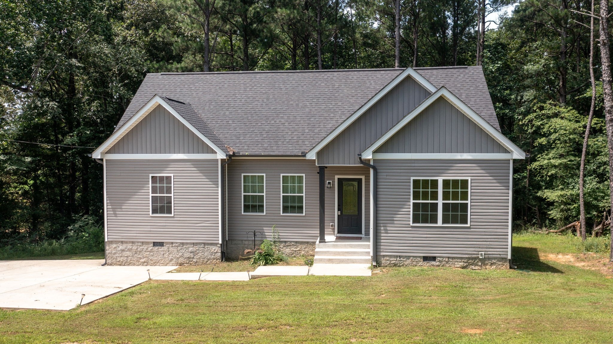 1663 Taylortown Road White Bluff, TN 37187 - Photo 37 of 38 a house that has a big yard in front of it