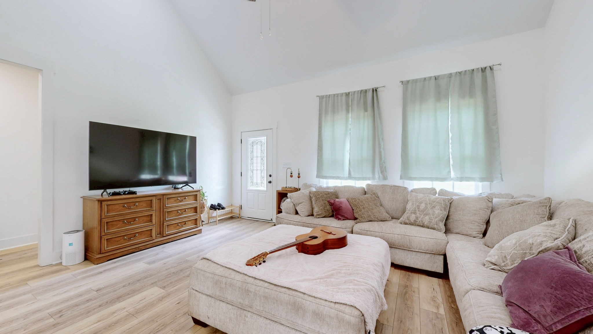 1663 Taylortown Road White Bluff, TN 37187 - Photo 5 of 38 a living room with furniture and a flat screen tv