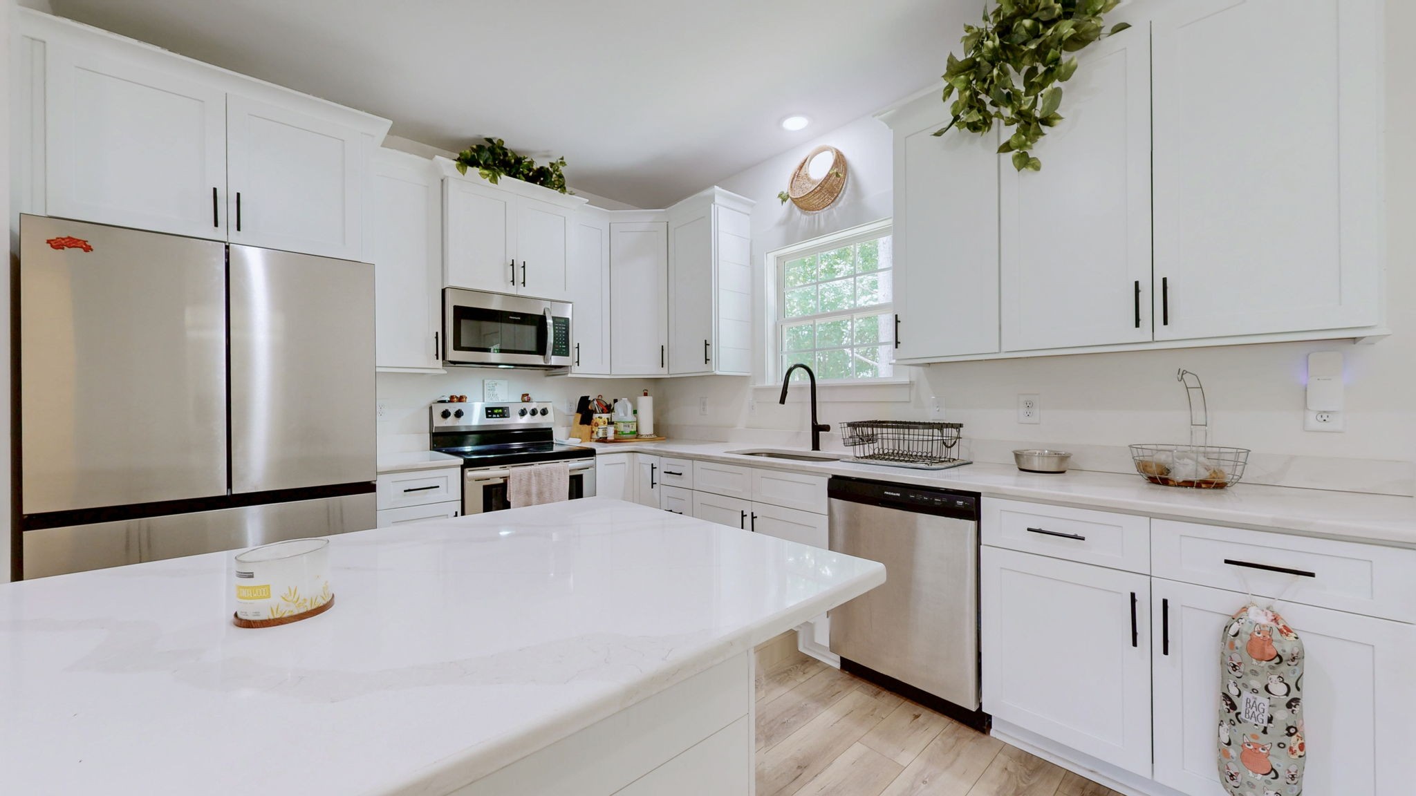 1663 Taylortown Road White Bluff, TN 37187 - Photo 9 of 38 a kitchen with appliances a sink and a counter space