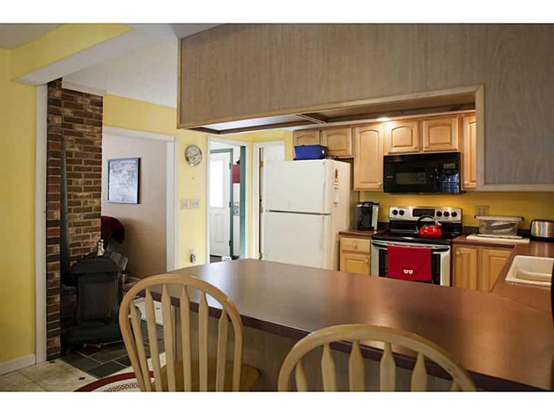 8 Old Hatchery Road Enfield, ME 04493 - Photo 8 of 32 Kitchen. Seating in the kitchen
