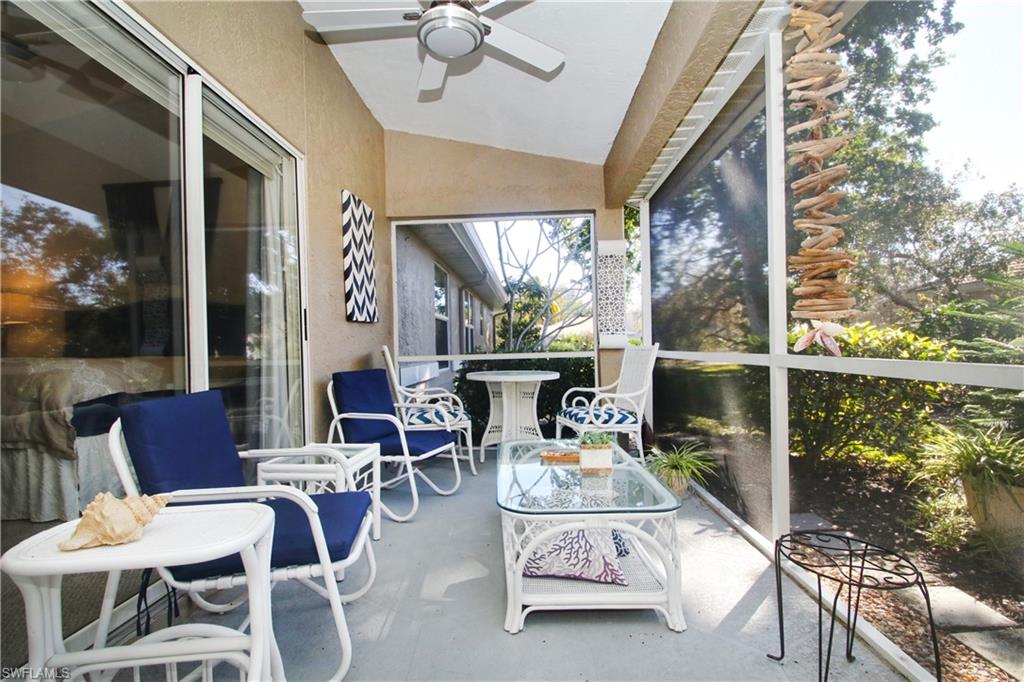 370 Emerald Bay Circle, Unit N8 Naples, FL 34110 - Photo 19 of 24 a outdoor space with furniture