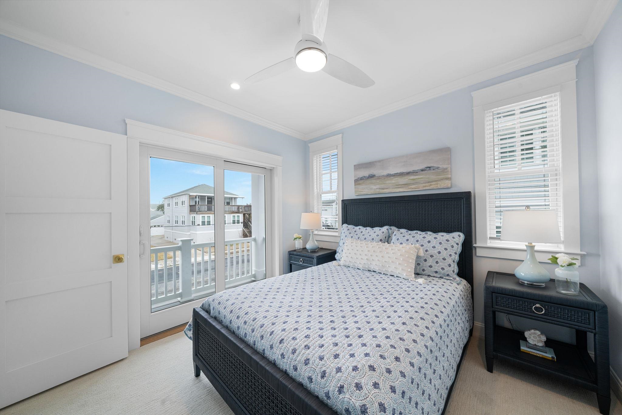9102 3rd Stone Harbor, NJ 08247 - Photo 21 of 24 a bedroom with a large bed and a window