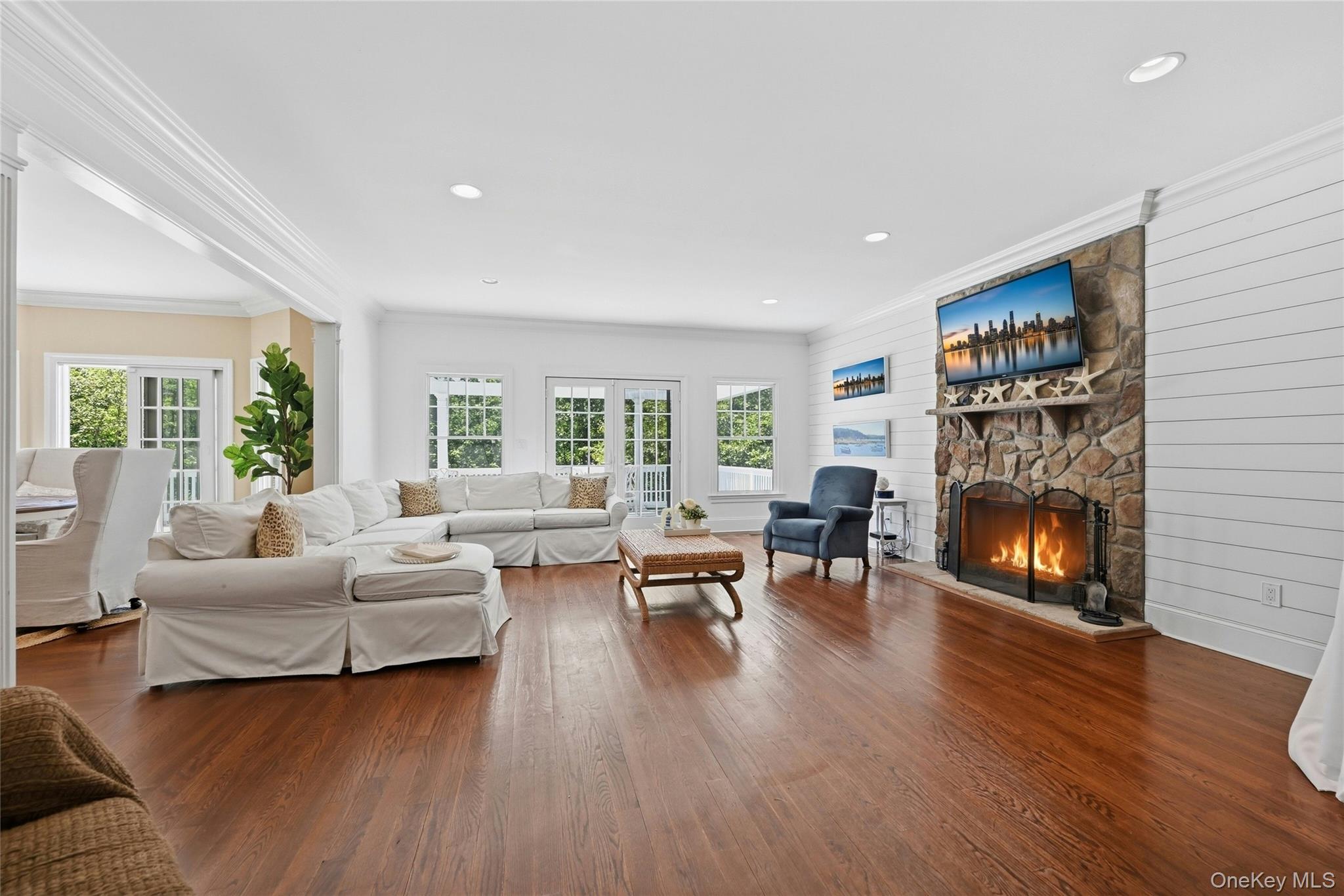 1330 Ridge Road Laurel Hollow, NY 11791 - Photo 12 of 47 Family Room with Shiplap Wall and Fireplace