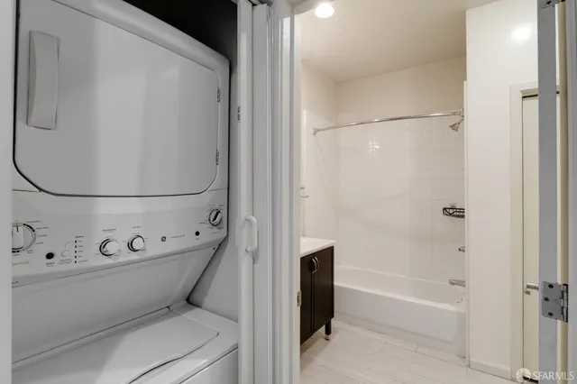 a bathroom with a bathtub and toilet
