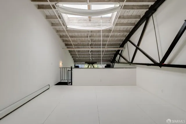 a view of entryway with a door and wooden floor