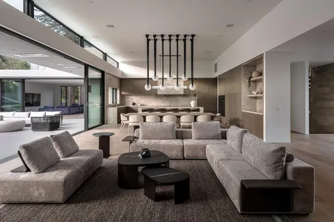 a kitchen with a table and chairs in it