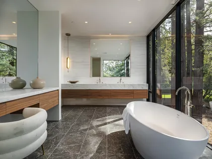 a view of a house with pool table and chairs