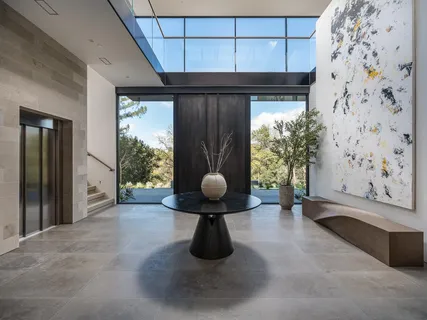 a bathroom with a sink a mirror and a bathtub