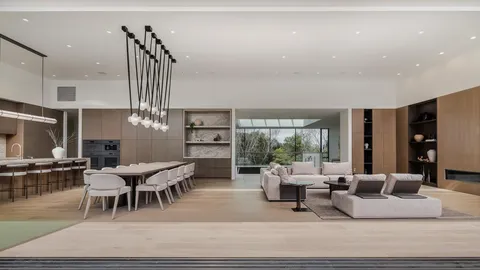a dinning table and chairs in a kitchen