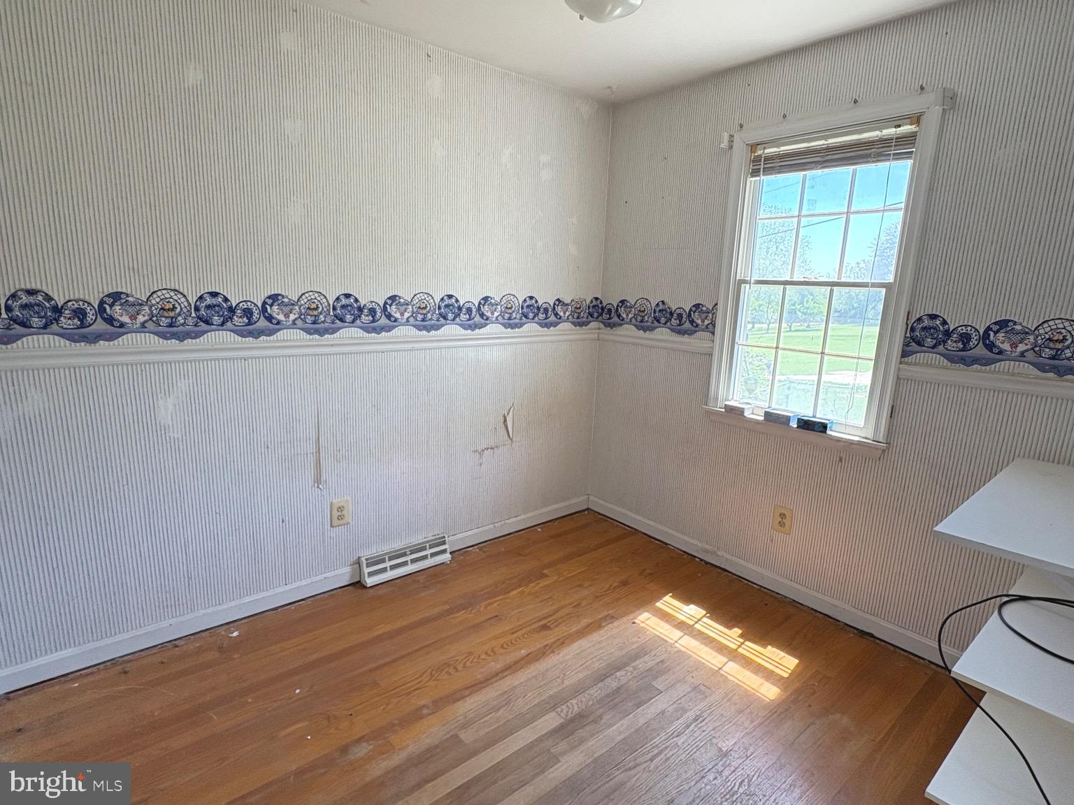 4215 Buffalo Road Mount Airy, MD 21771 - Photo 15 of 44 a view of a room with wooden floor and cabinet