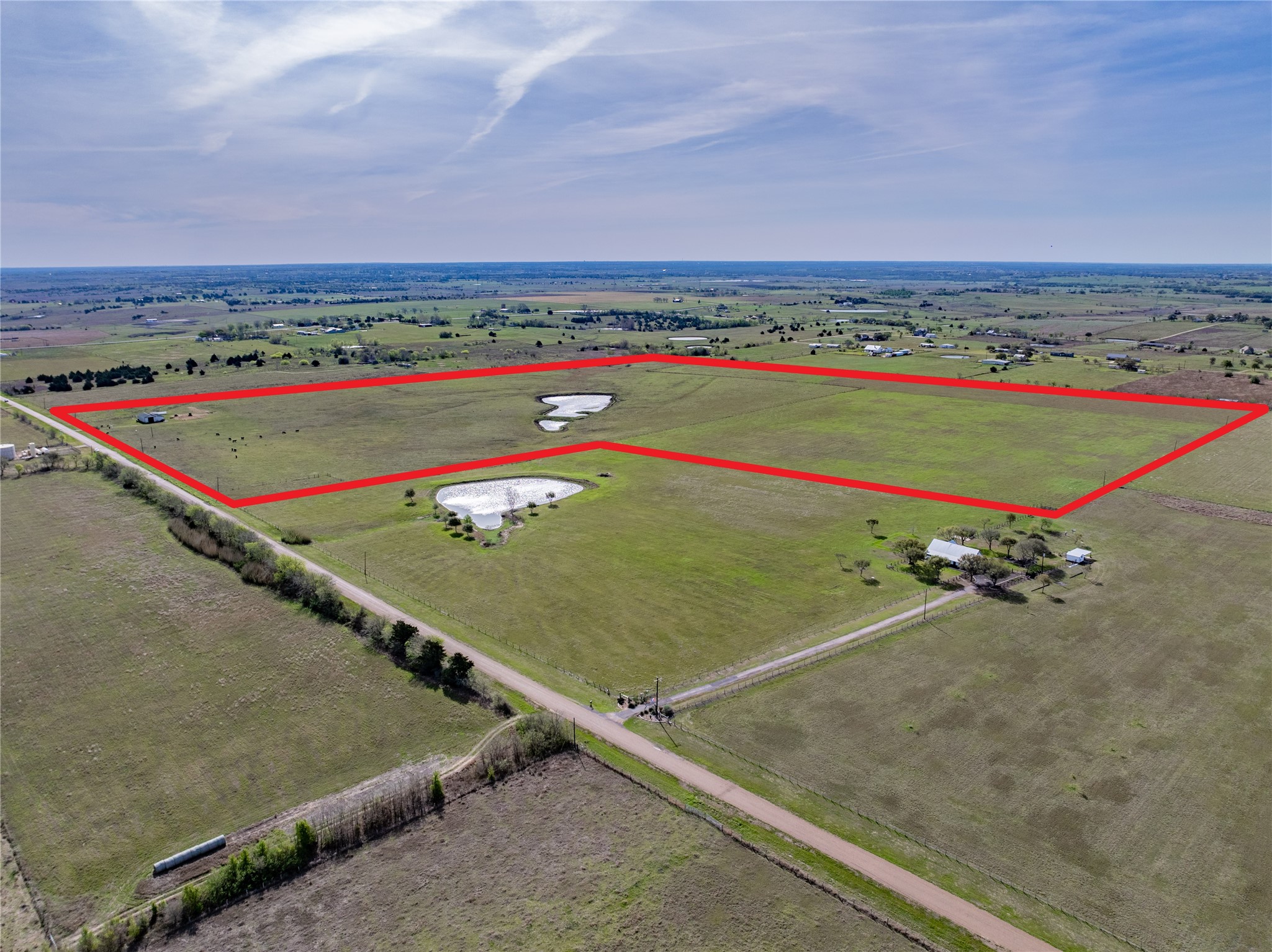 555 Knape Road La Grange, TX 78945 - Photo 1 of 28 an aerial view of a tennis court
