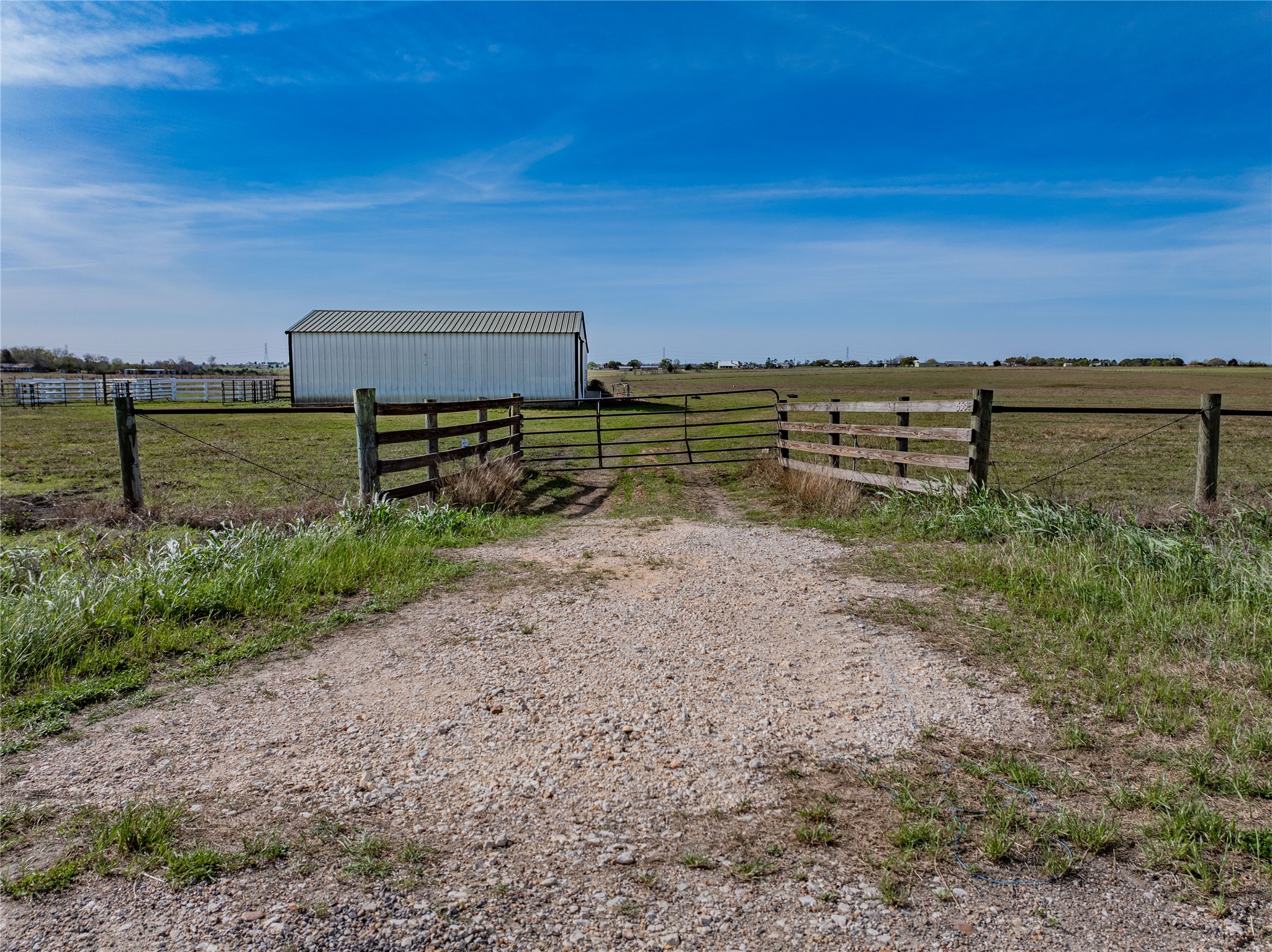 555 Knape Road La Grange, TX 78945 - Photo 27 of 28 a view of a field with wooden fence
