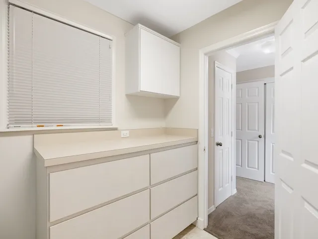 a bathroom with a sink a vanity and a mirror