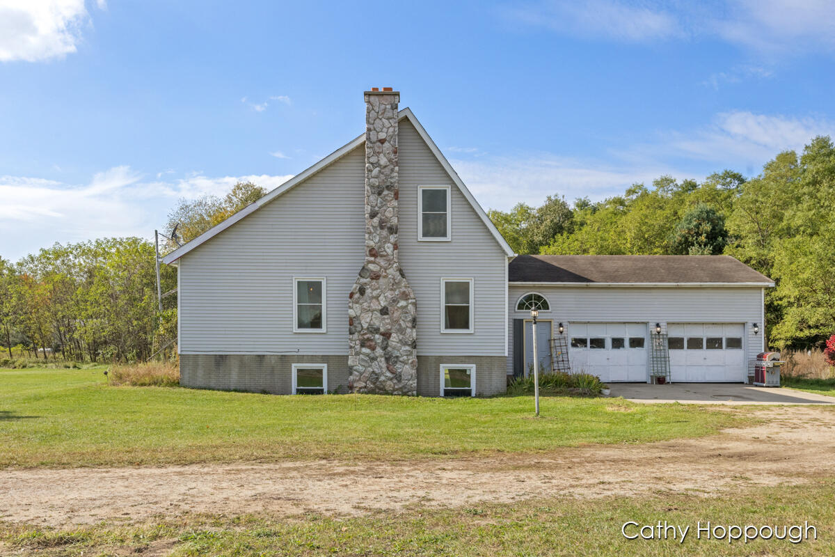 6121 Schaeffer Road Ionia, MI 48846 - Photo 1 of 37 IMG_1000