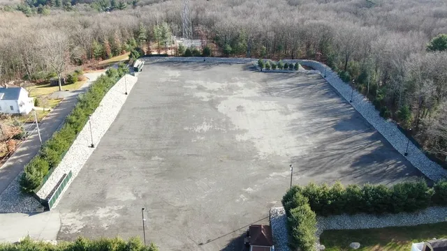 a view of a pathway with a bench