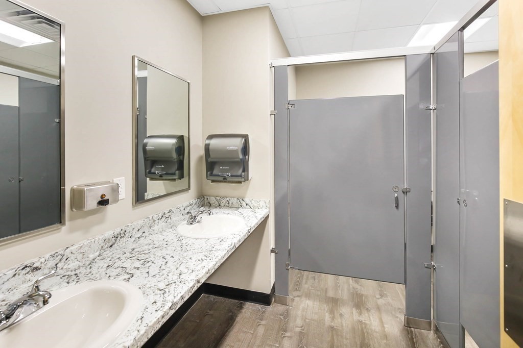 5 Harrington Street Mendon, MA 01756 - Photo 12 of 17 a bathroom with a granite countertop sink and a mirror