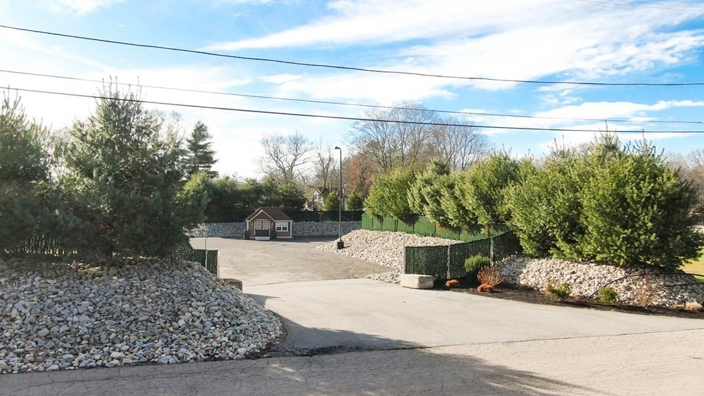 5 Harrington Street Mendon, MA 01756 - Photo 4 of 17 a view of a back yard from a balcony
