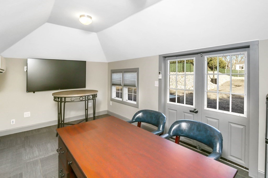5 Harrington Street Mendon, MA 01756 - Photo 7 of 17 a living room with furniture and a flat screen tv