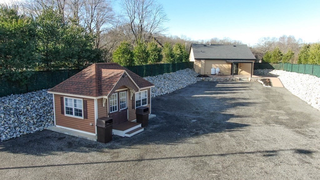 5 Harrington Street Mendon, MA 01756 - Photo 9 of 17 a house that has a tree in front of it