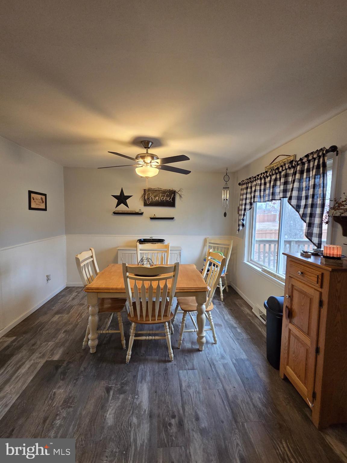 64 Rosedale Drive Bridgeton, NJ 08302 - Photo 6 of 16 a view of a dining room with furniture and wooden floor