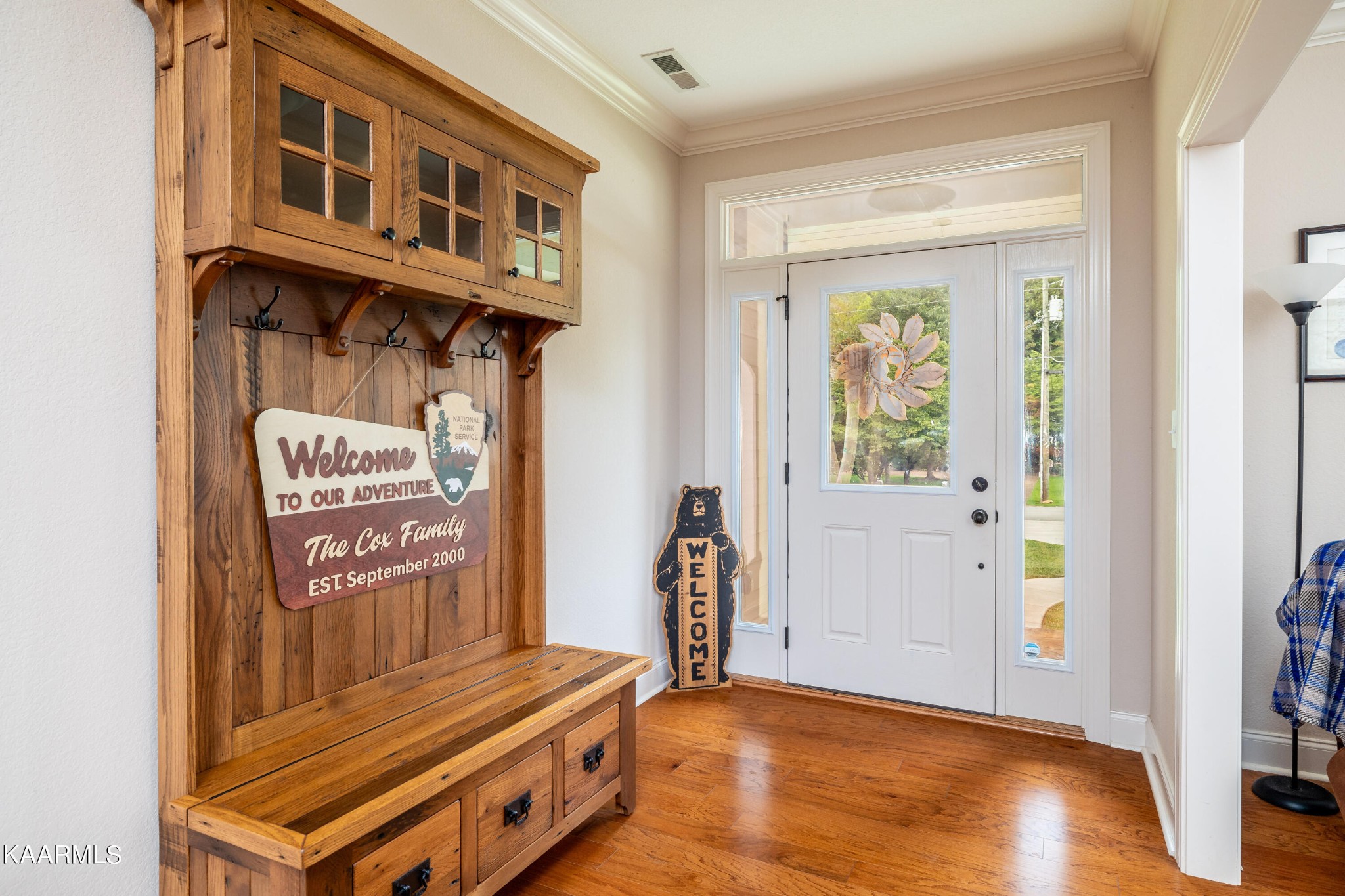232 Riverview Road Townsend, TN 37882 - Photo 14 of 38 a view of an entryway with wooden floor and windows