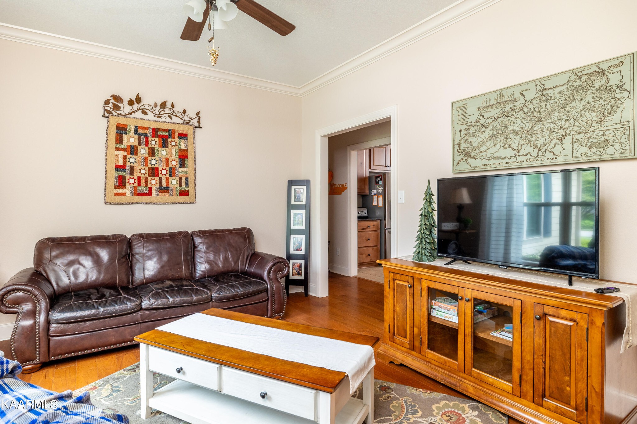 232 Riverview Road Townsend, TN 37882 - Photo 16 of 38 a living room with furniture and a flat screen tv