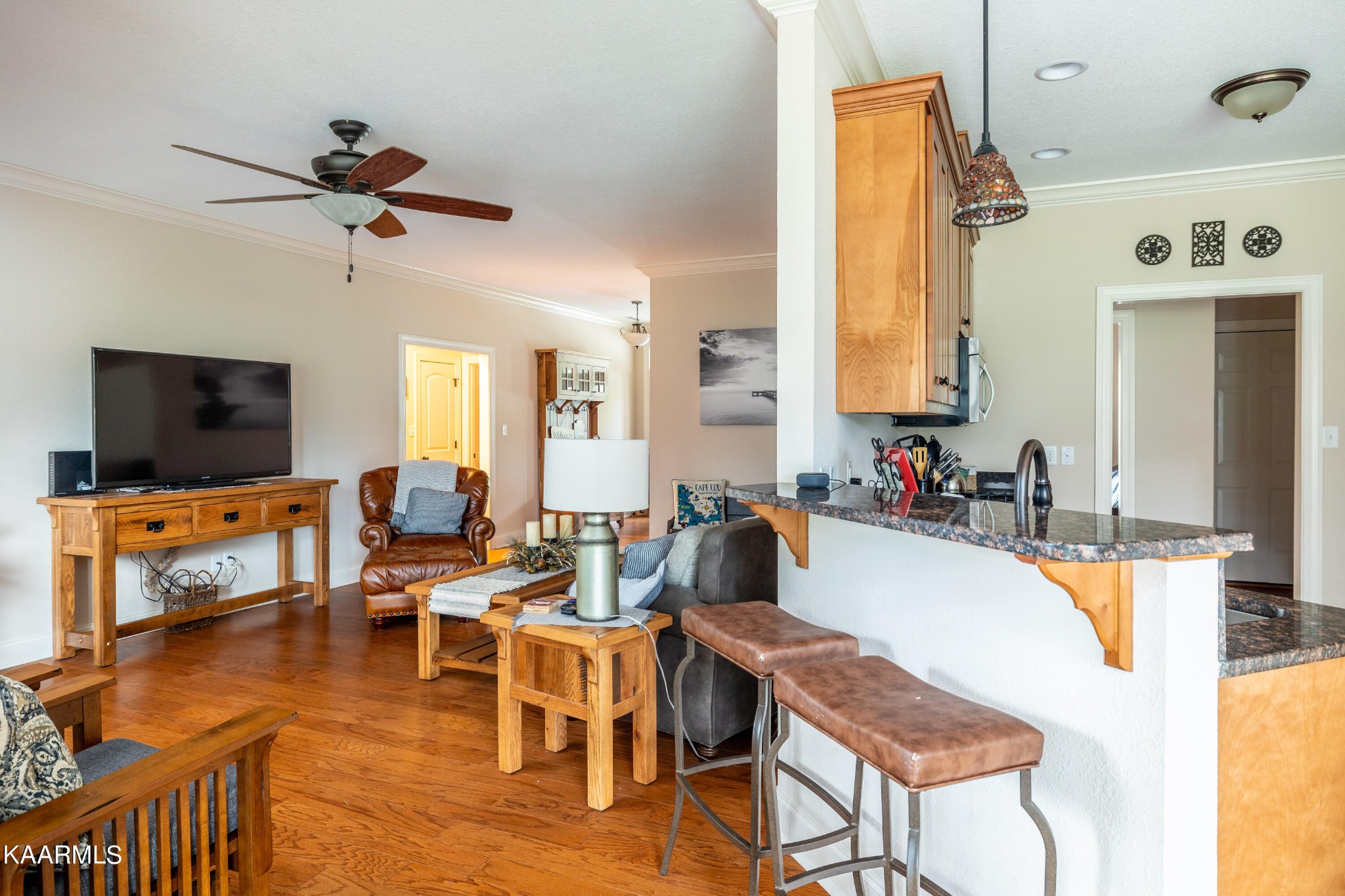 232 Riverview Road Townsend, TN 37882 - Photo 20 of 38 a living room with furniture and a flat screen tv