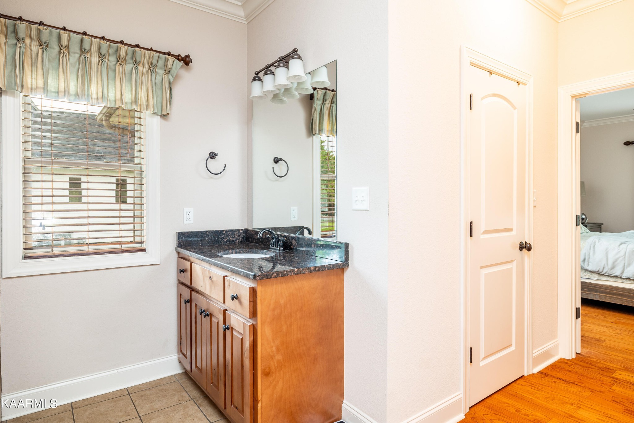 232 Riverview Road Townsend, TN 37882 - Photo 28 of 38 a bathroom with a granite countertop shower and a sink