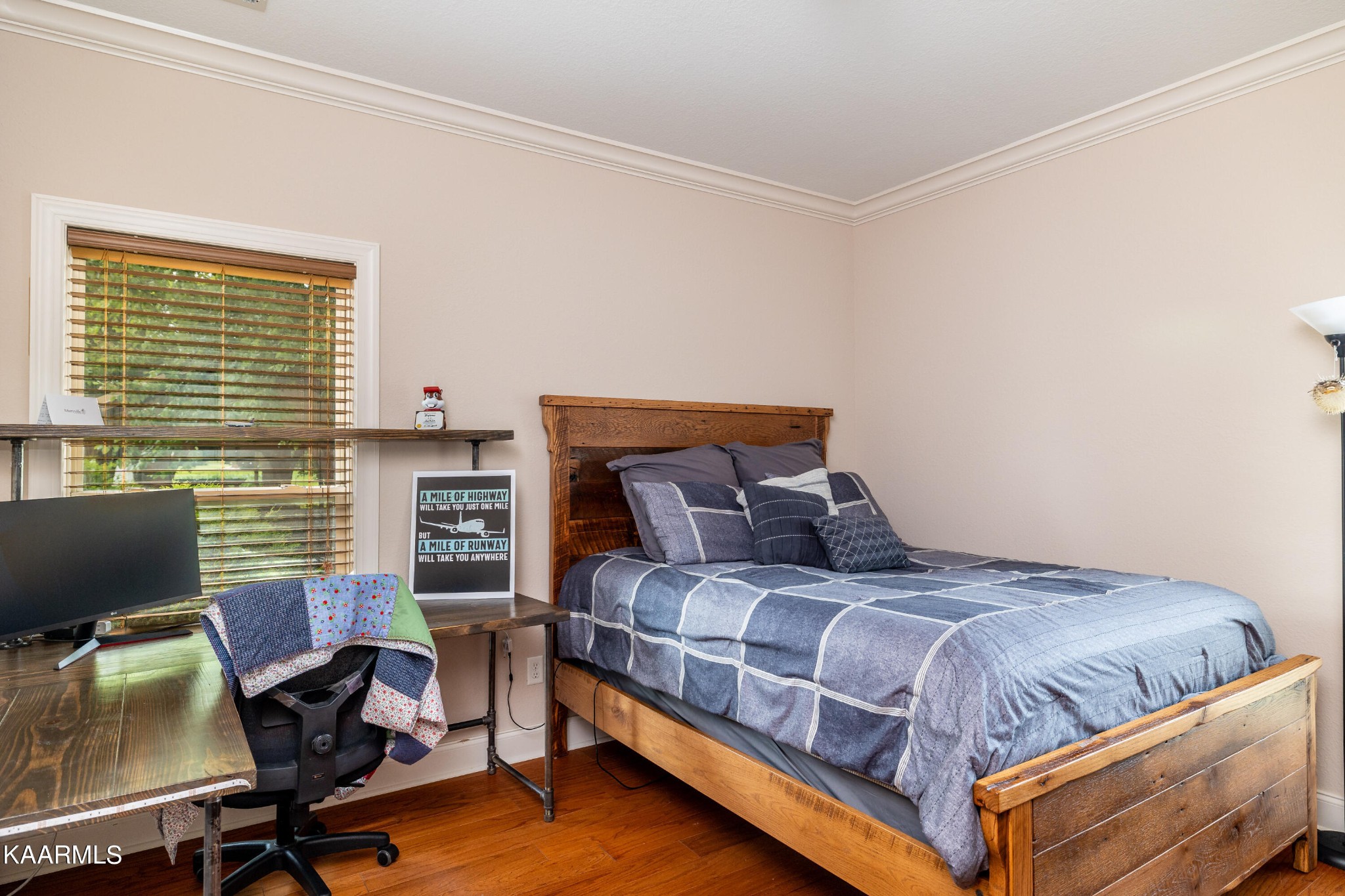 232 Riverview Road Townsend, TN 37882 - Photo 34 of 38 a bedroom with a bed and a desk