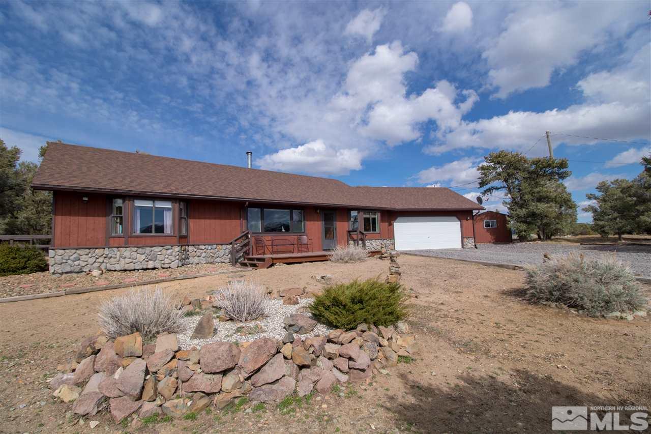 1945 Saddleback Road Reno, NV 89521 - Photo 1 of 1 a front view of a house with yard