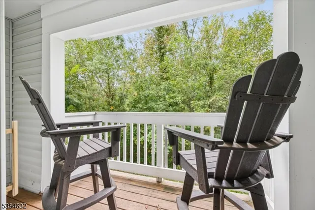 a view of balcony with furniture