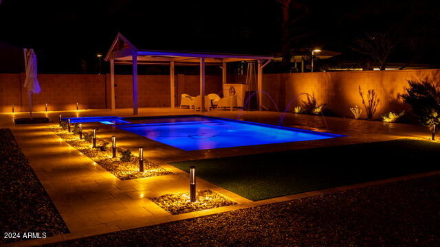 14370 West Hearn Road Surprise, AZ 85379 - Photo 43 of 58 backyard at night